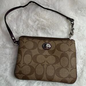COACH Brown Signature Coated Canvas Wristlet